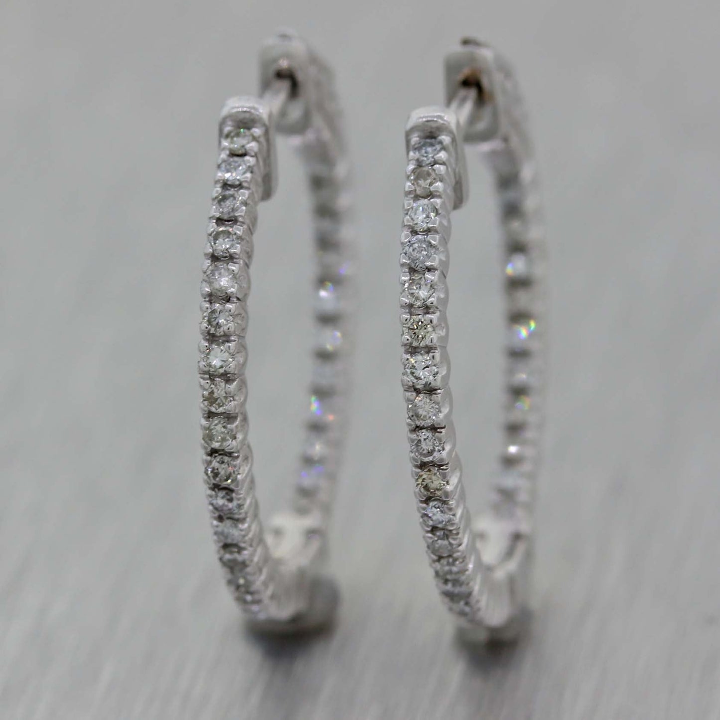 Ladies 14K White Gold .71ctw Diamond 2mm In-Out Hoop Earrings